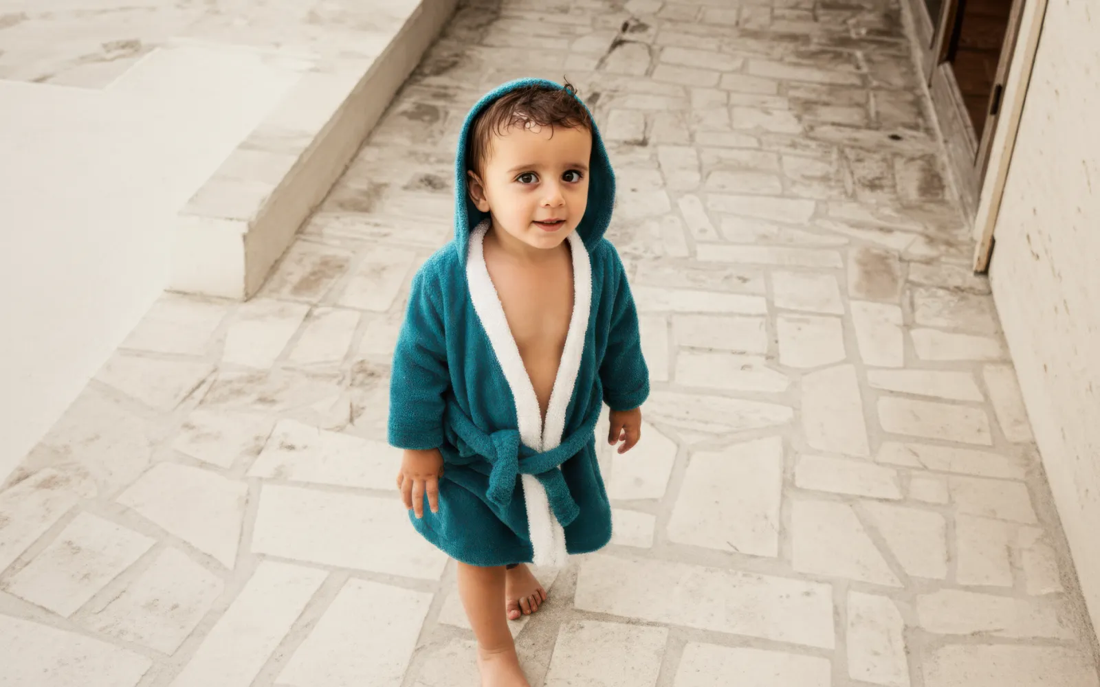 child wearing bathrobe