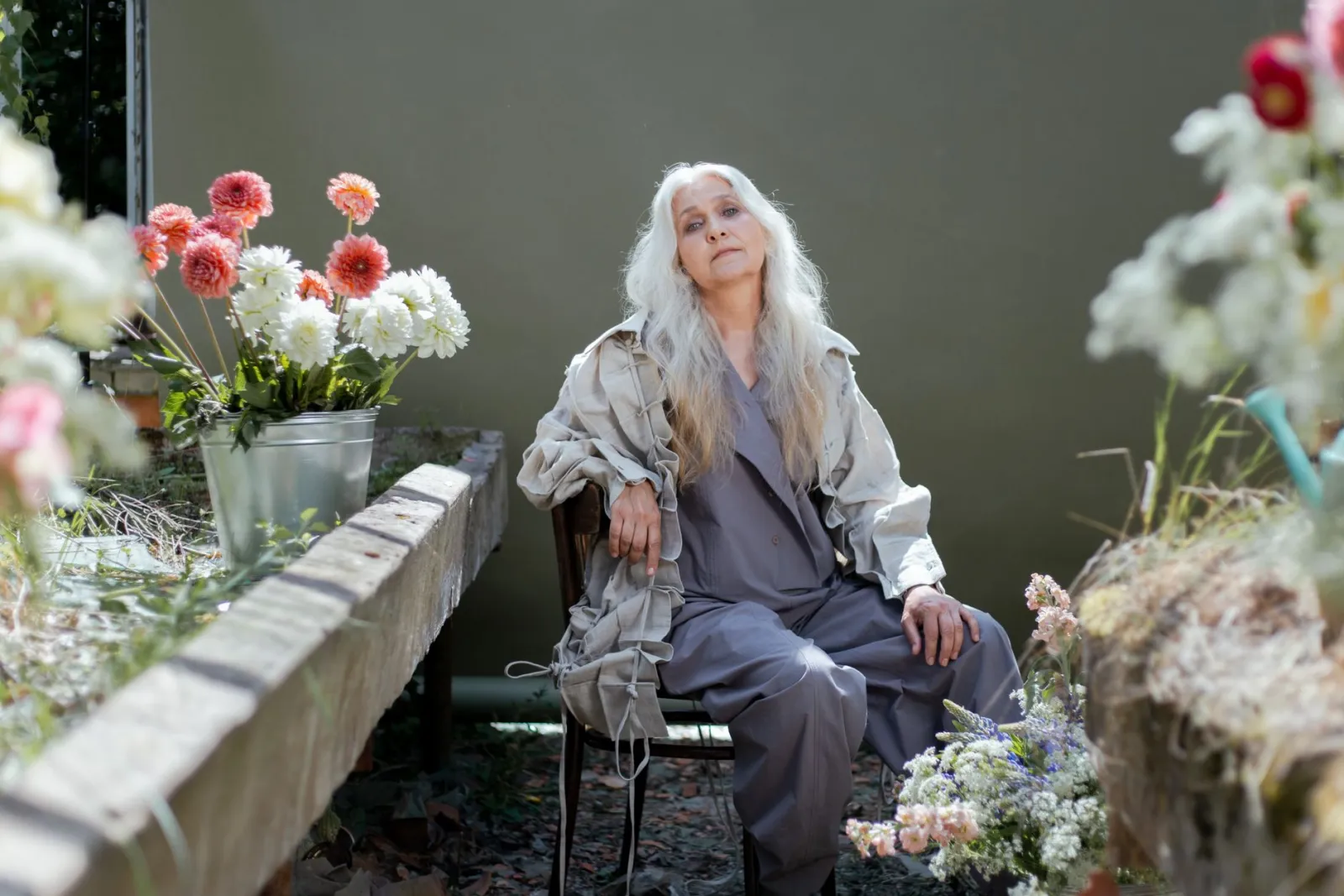 elderly woman garden chair