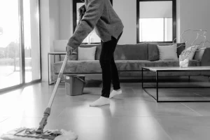 person mopping floor